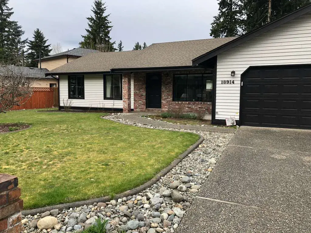 Exterior remodel with siding and garage door work in Pierce County Washington
